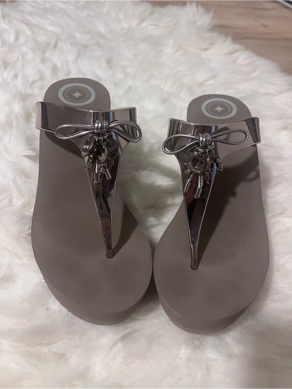 BCBGeneration Metallic Silver Bow Thong Sandals